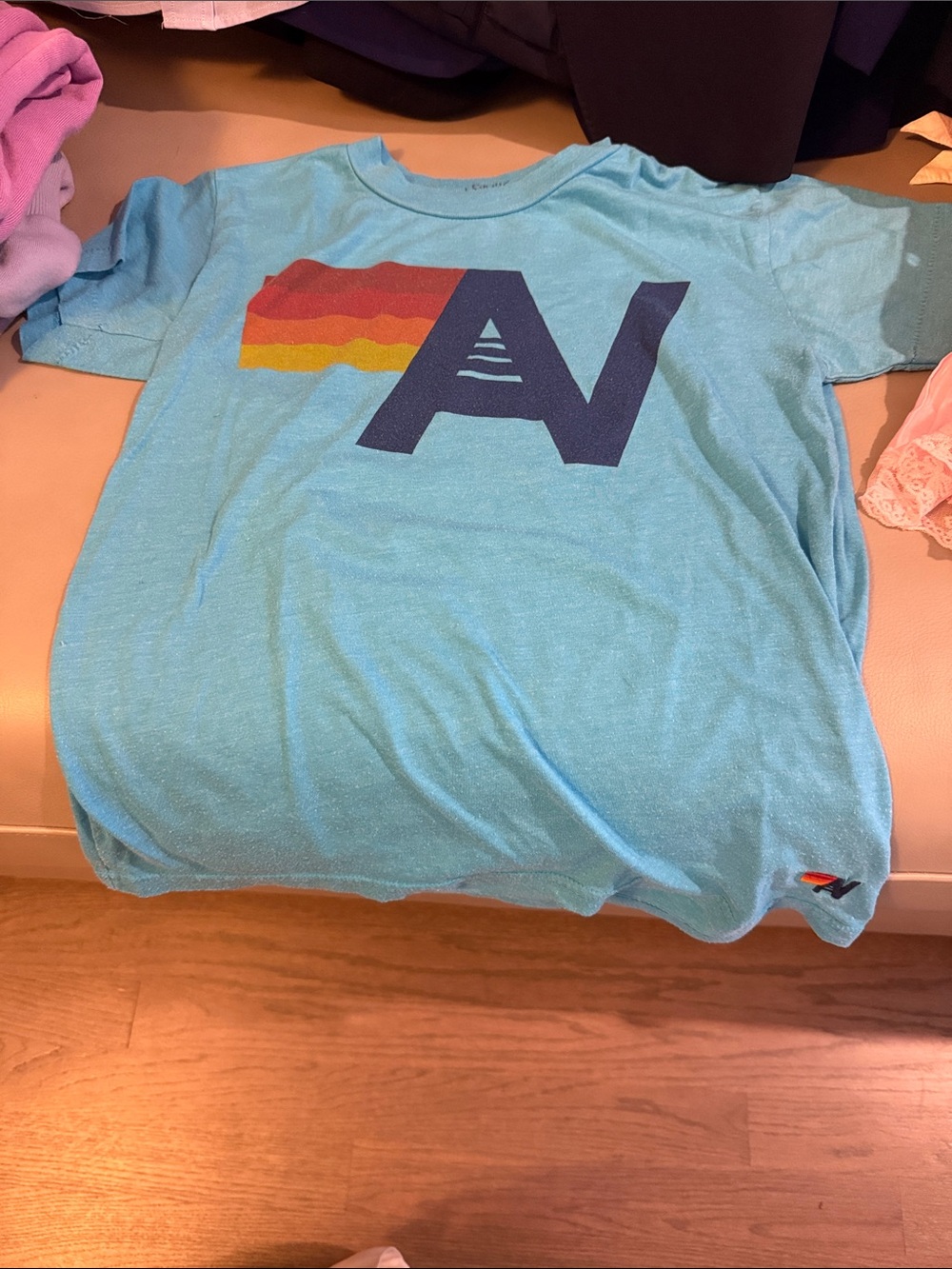 Aviator Nation Light Blue Kids Tee with Navy Logo and Rainbow Stripe